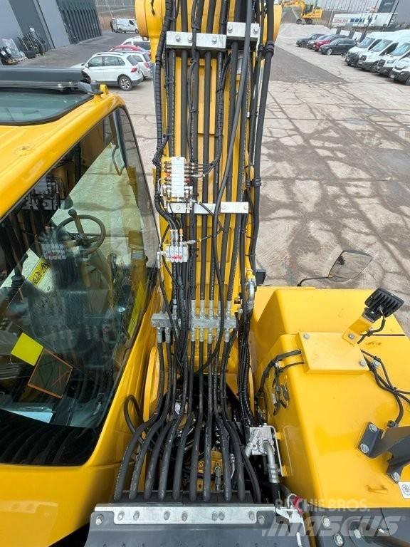 Komatsu PW160-11 Kolesové rýpadlá