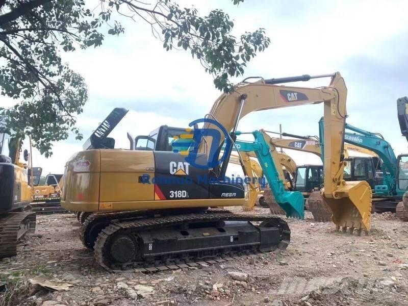 CAT 318DL Pásové rýpadlá