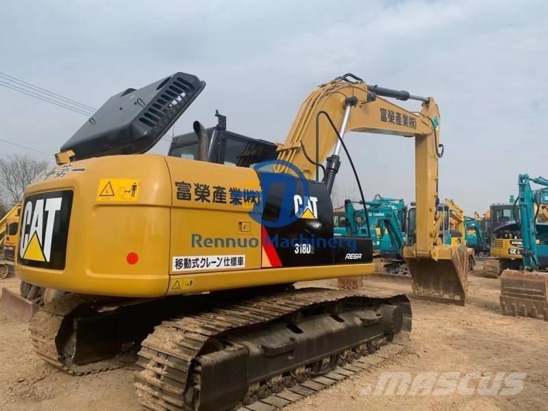 CAT 318DL Pásové rýpadlá