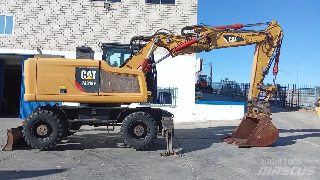 CAT M318F Kolesové rýpadlá