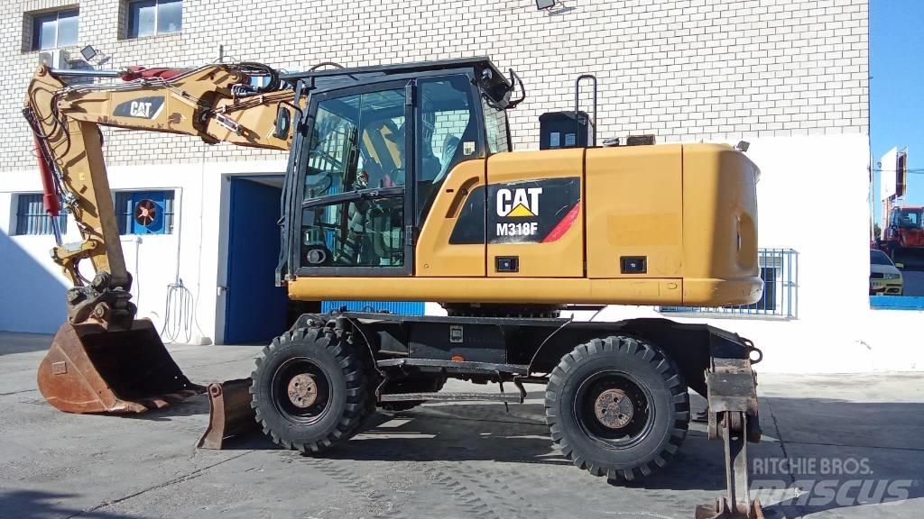 CAT M318F Kolesové rýpadlá