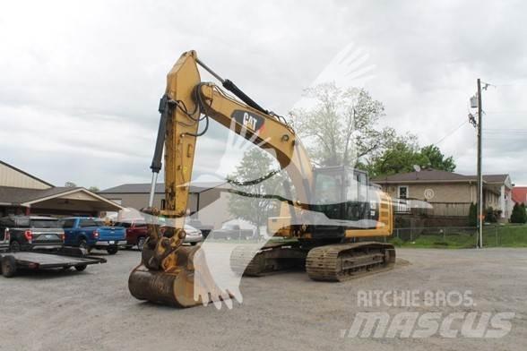 CAT 323FL Pásové rýpadlá