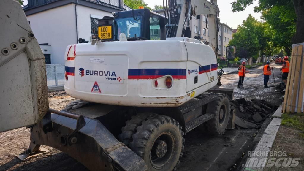 CAT 313 D Kolesové rýpadlá