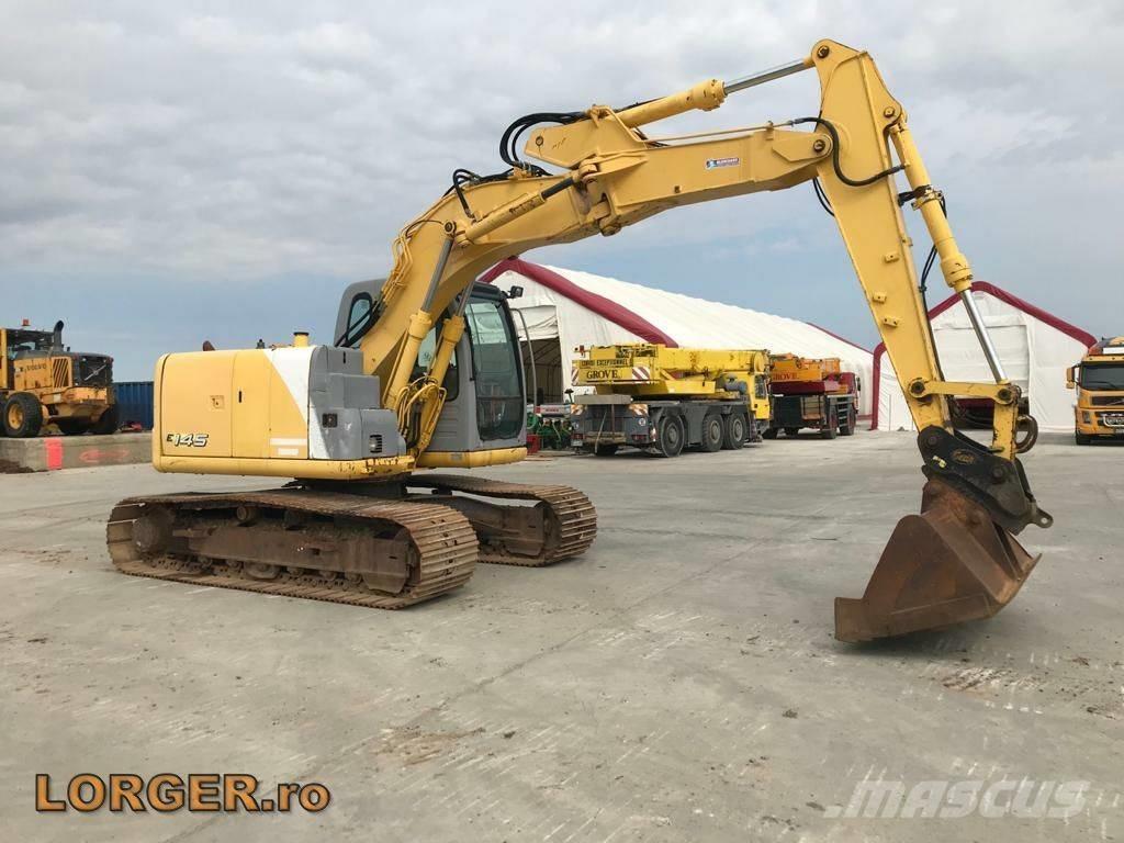 New Holland E 145 Pásové rýpadlá