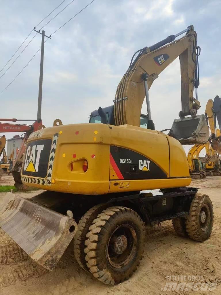 CAT M315D2 Pásové rýpadlá