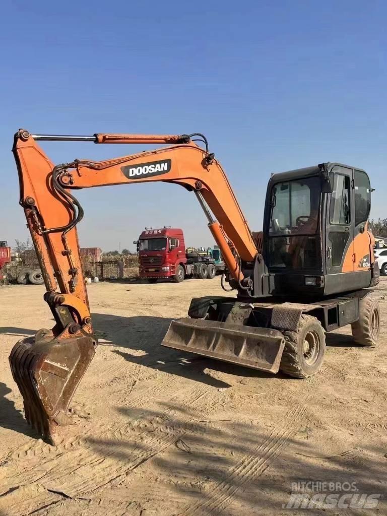 Doosan DX60W Kolesové rýpadlá