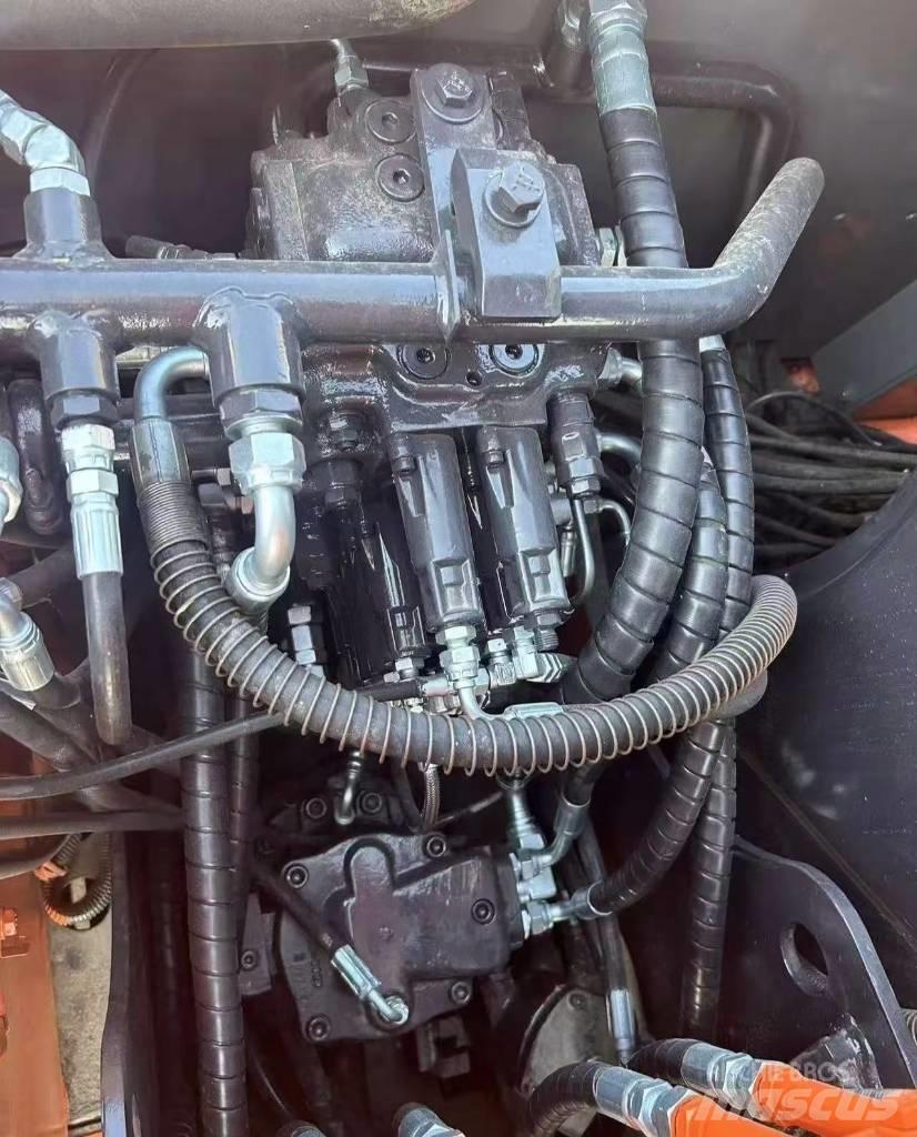Hitachi 70 Pásové rýpadlá