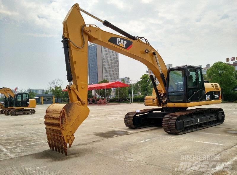 CAT 323 Pásové rýpadlá
