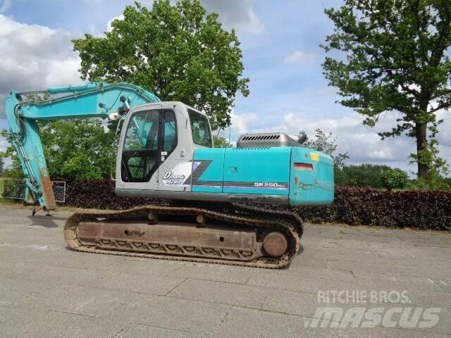 Kobelco SK250NLC Pásové rýpadlá