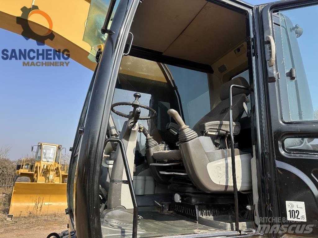 CAT M320D Kolesové rýpadlá