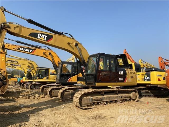 CAT 323D Pásové rýpadlá