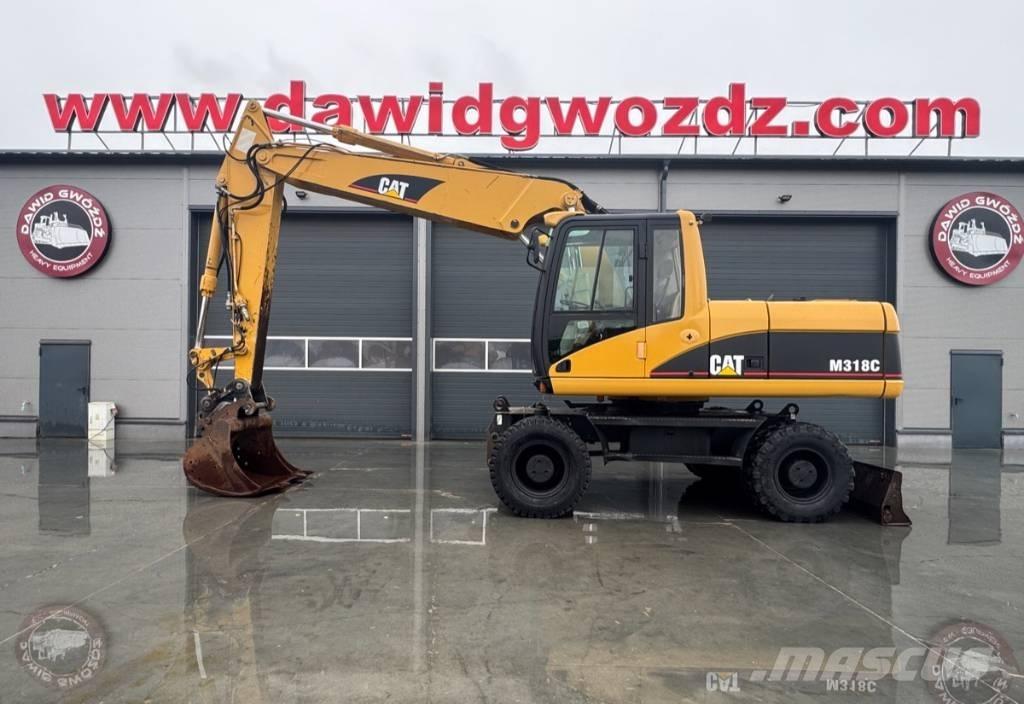 CAT M 318 C Kolesové rýpadlá