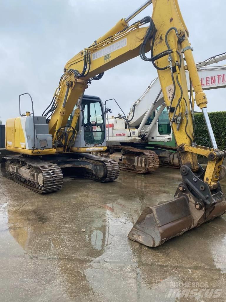 New Holland E 145 Pásové rýpadlá