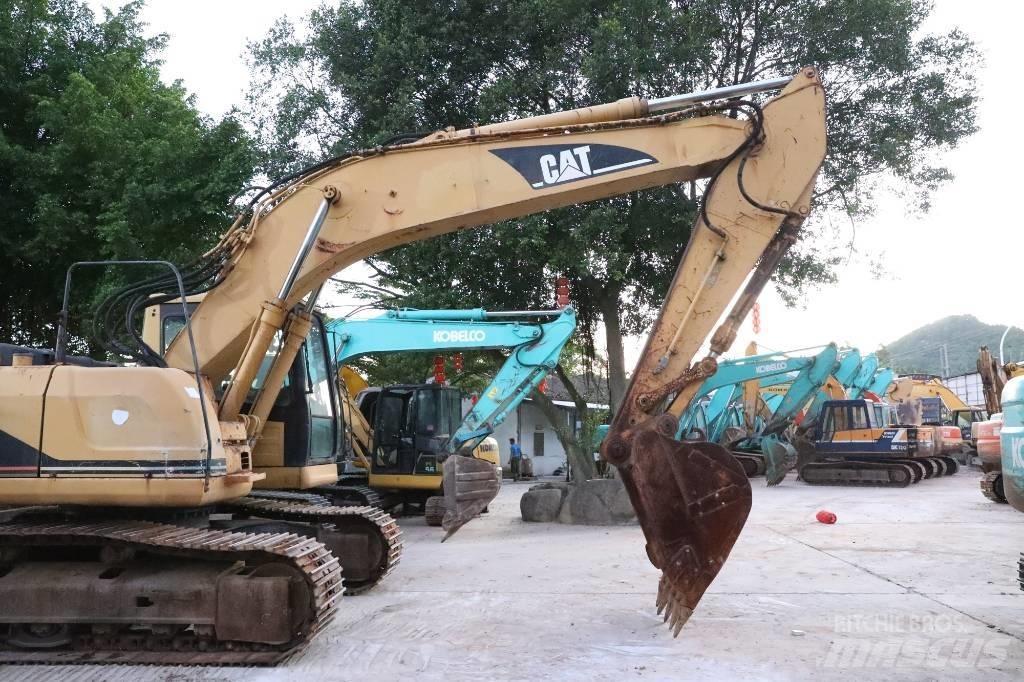 CAT 320BU Pásové rýpadlá