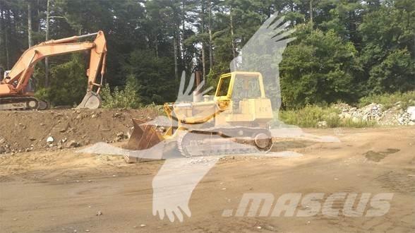 John Deere 855 Pásové nakladače