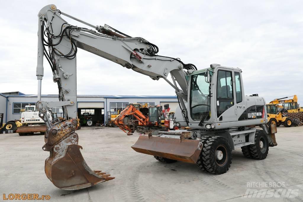 CAT M 313 D Kolesové rýpadlá