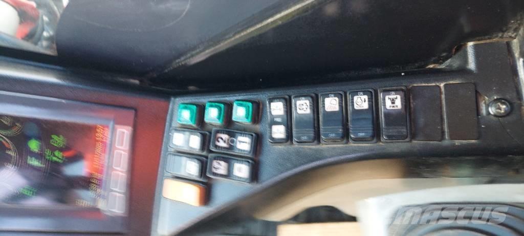 Takeuchi TB 295 W Kolesové rýpadlá