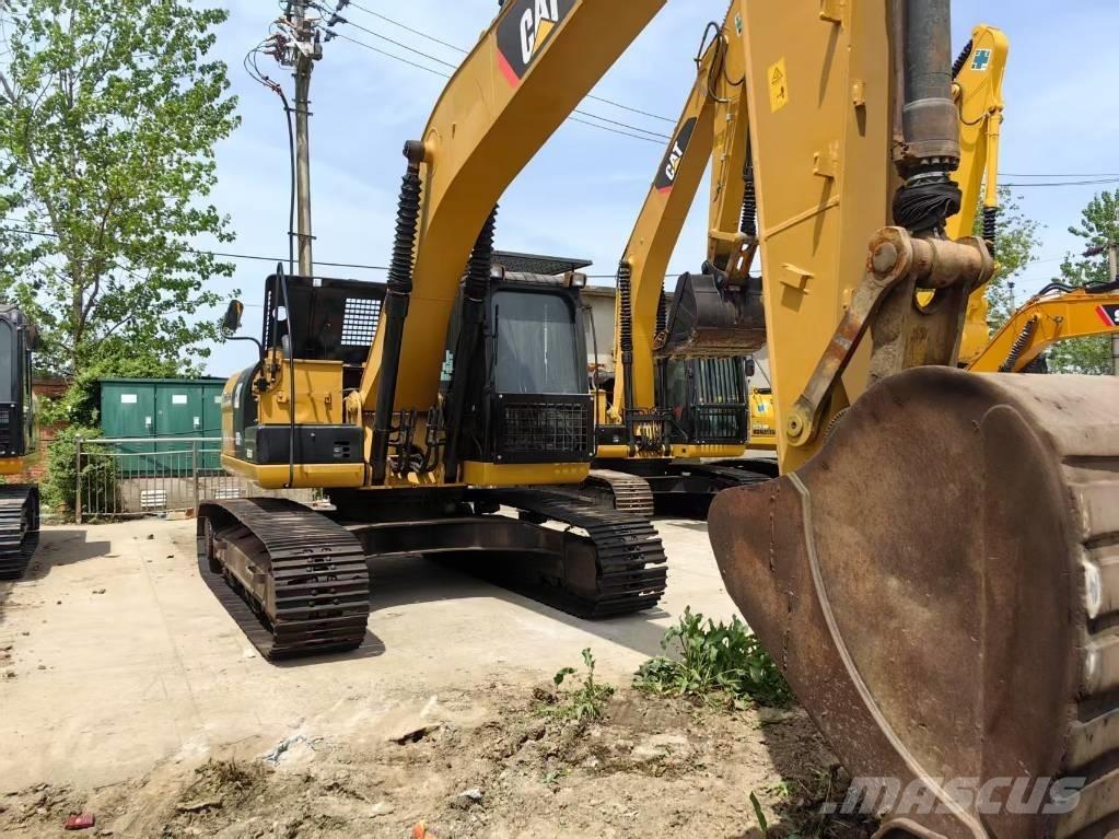 CAT 323 D Pásové rýpadlá
