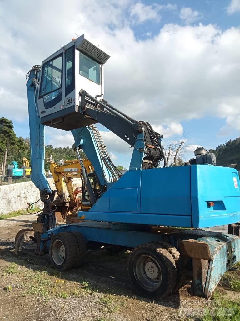 Fuchs MHL 331 Stroje pre manipuláciu s odpadom