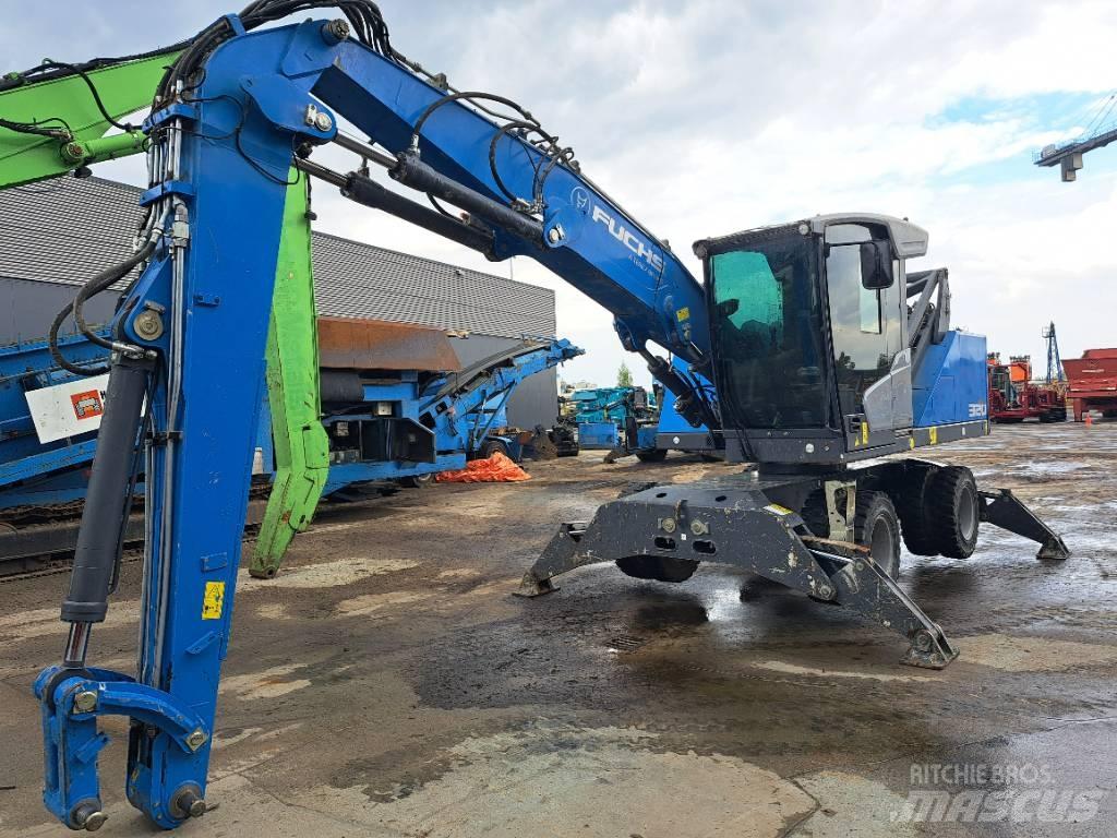 Fuchs MHL320F Stroje pre manipuláciu s odpadom