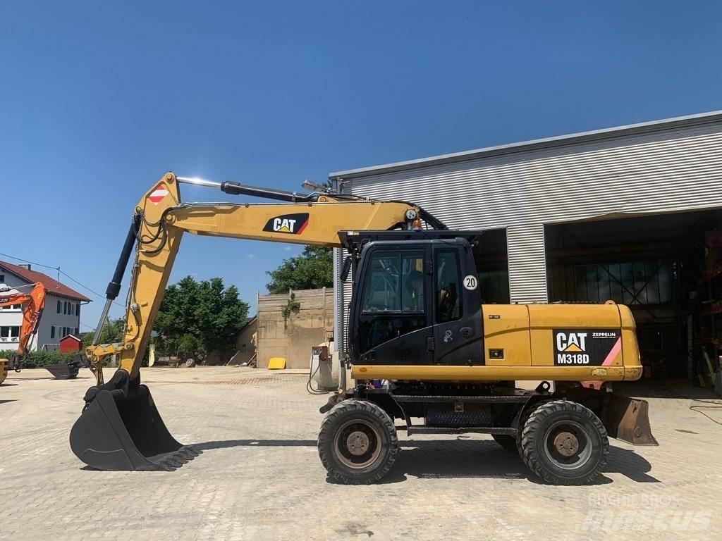 CAT M 318 D Kolesové rýpadlá