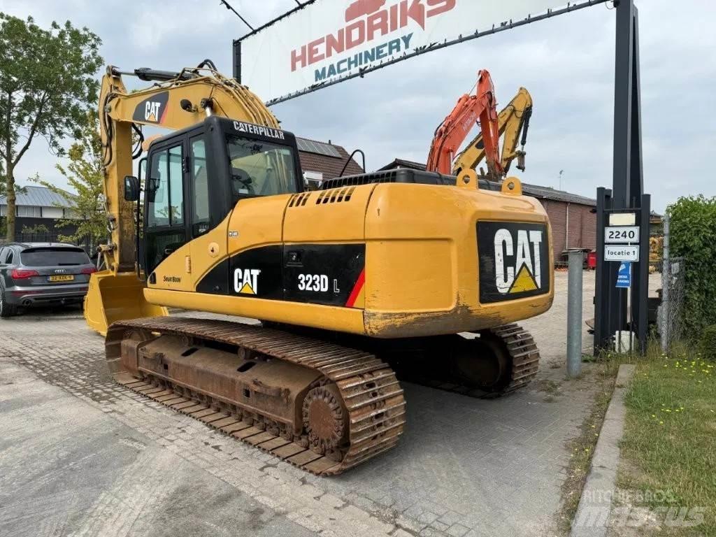 CAT 323DL (320DL) Pásové rýpadlá