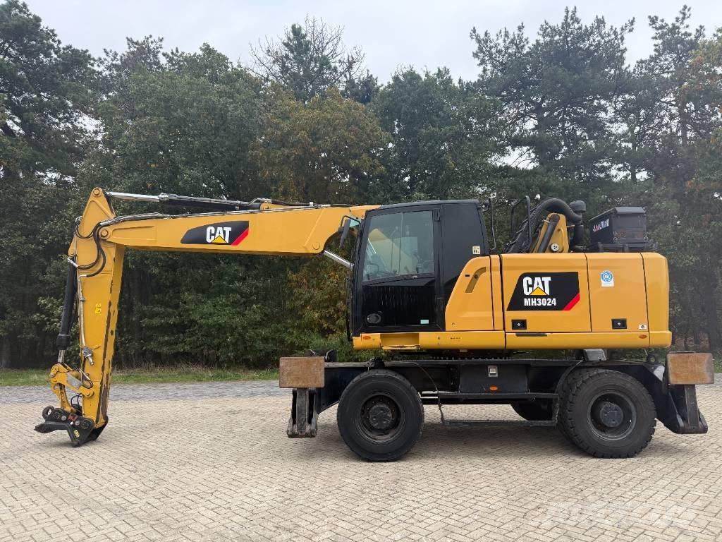 CAT MH 3024 Kolesové rýpadlá