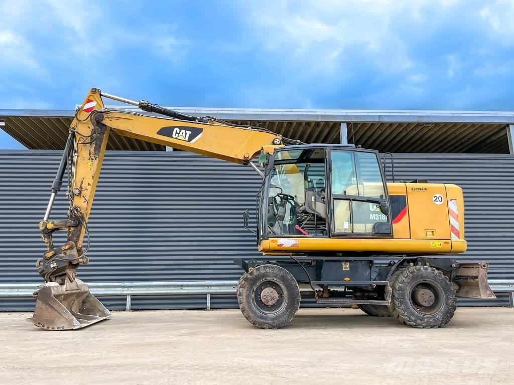 CAT M318F Kolesové rýpadlá