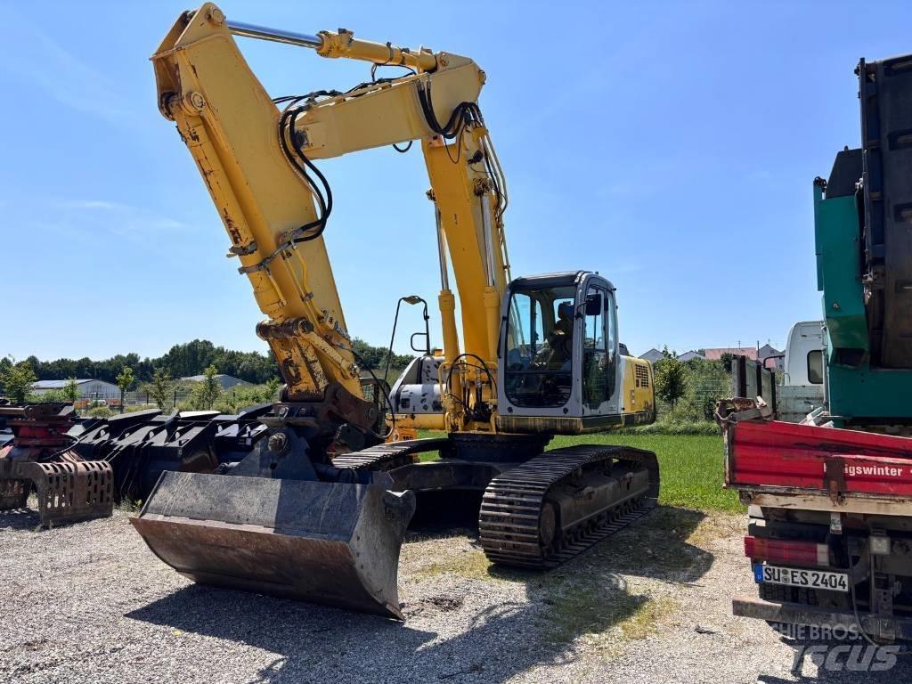 New Holland E 305 Pásové rýpadlá