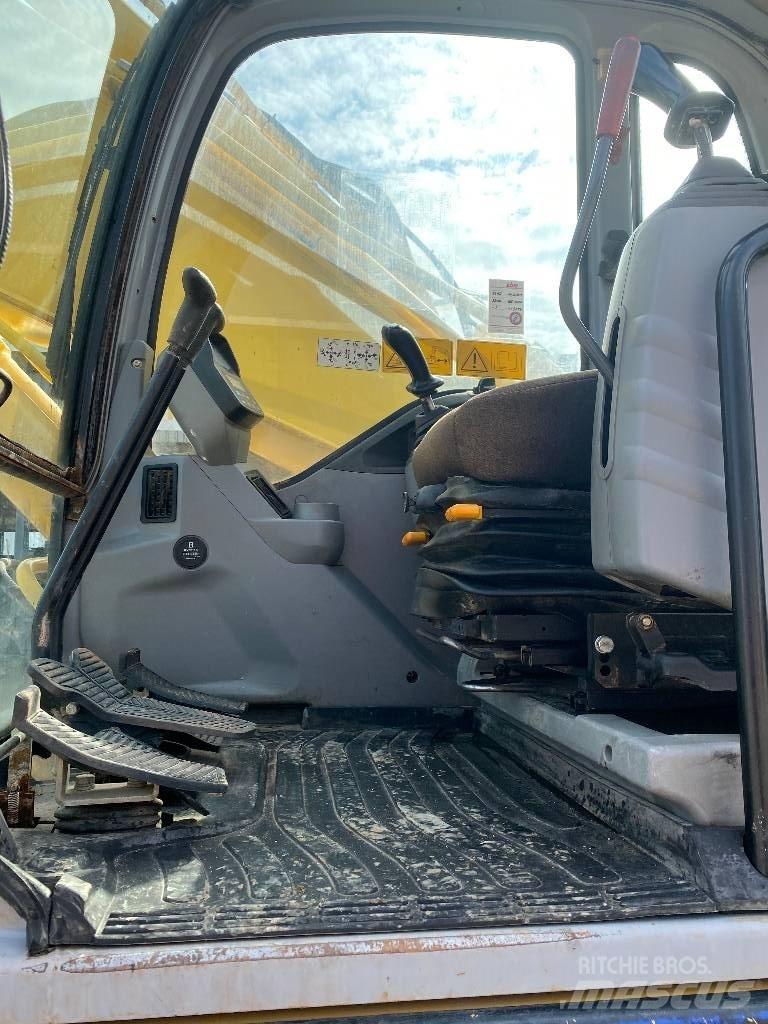 New Holland E 305 Pásové rýpadlá