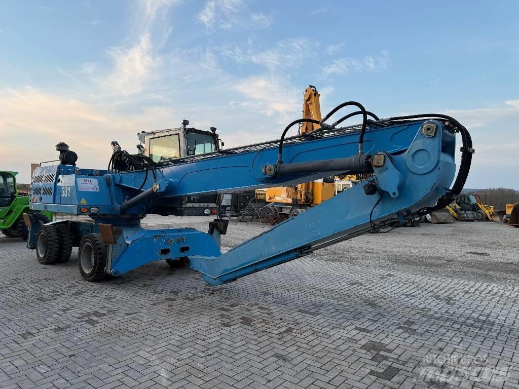 Fuchs MHL 331 Stroje pre manipuláciu s odpadom