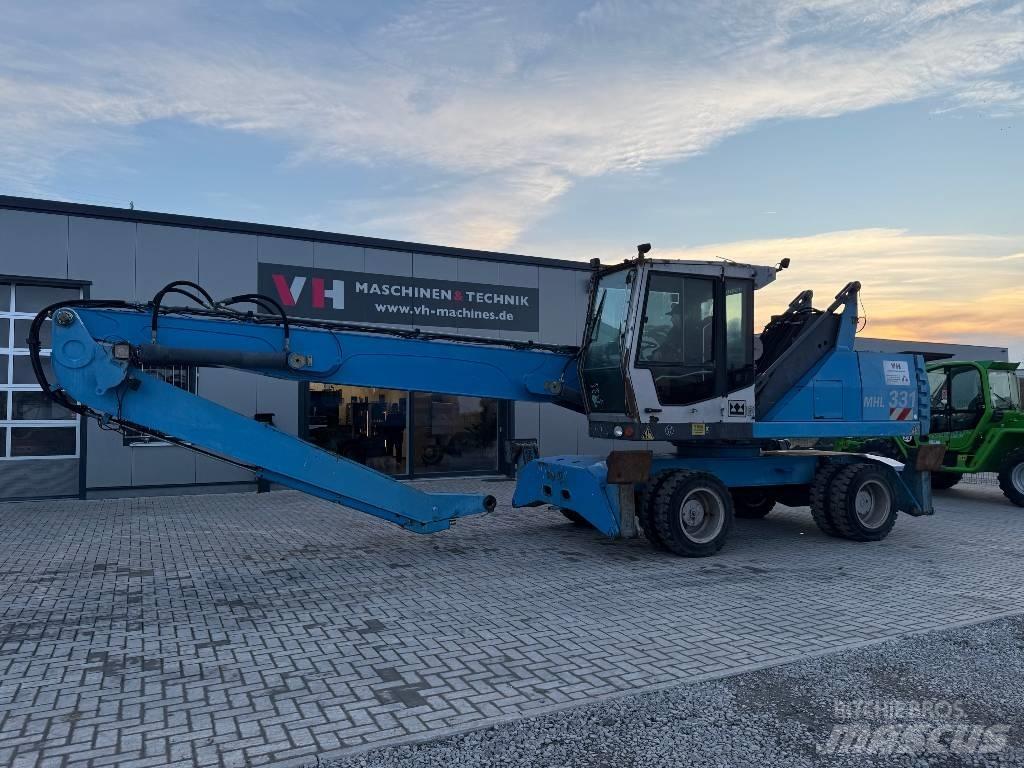 Fuchs MHL 331 Stroje pre manipuláciu s odpadom