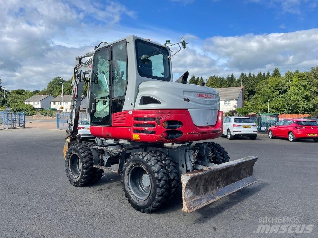 Takeuchi TB295W Kolesové rýpadlá