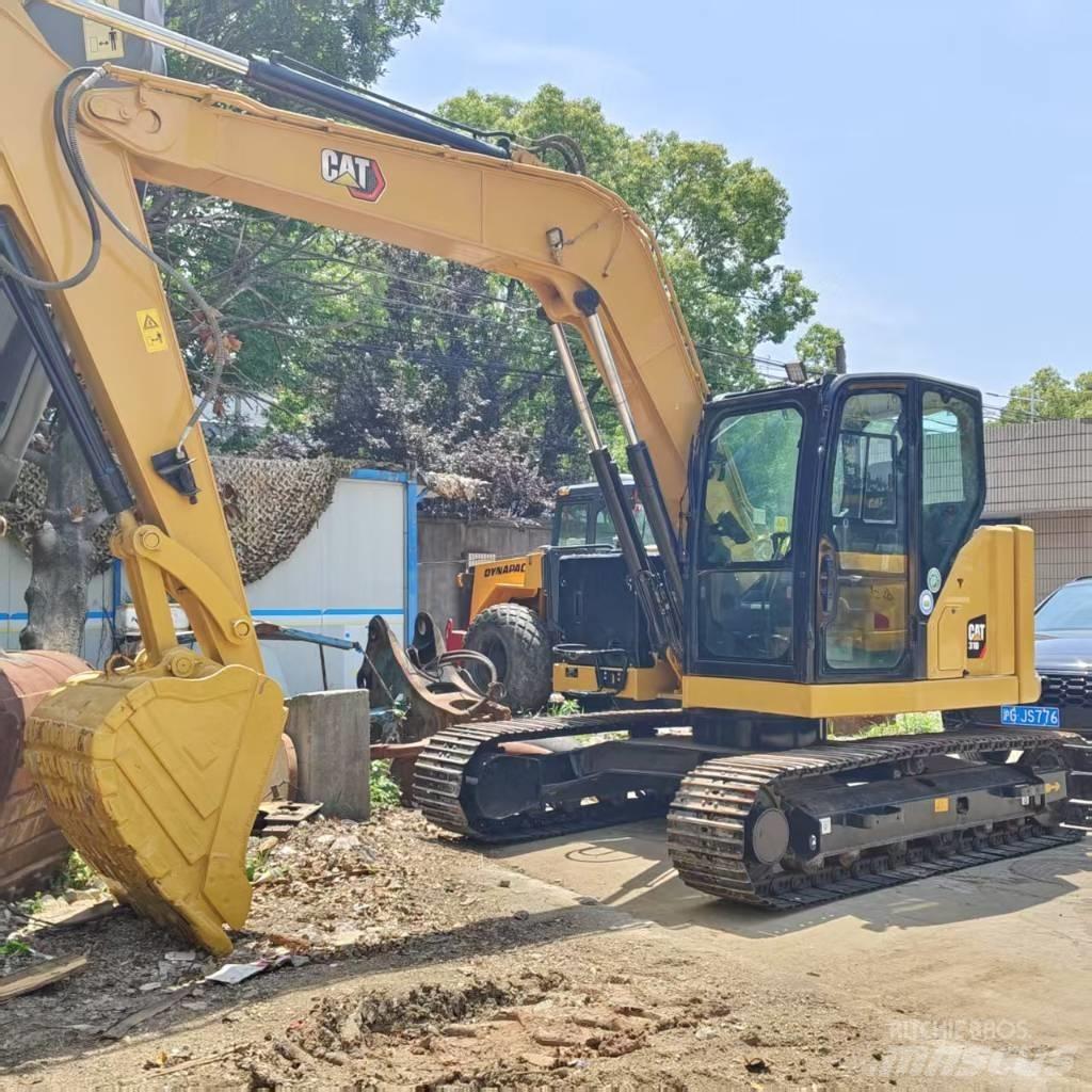 CAT 310 Pásové rýpadlá
