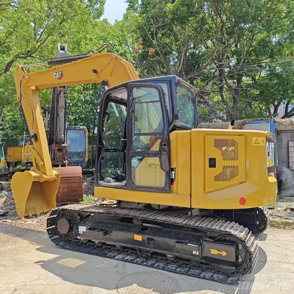 CAT 310 Pásové rýpadlá