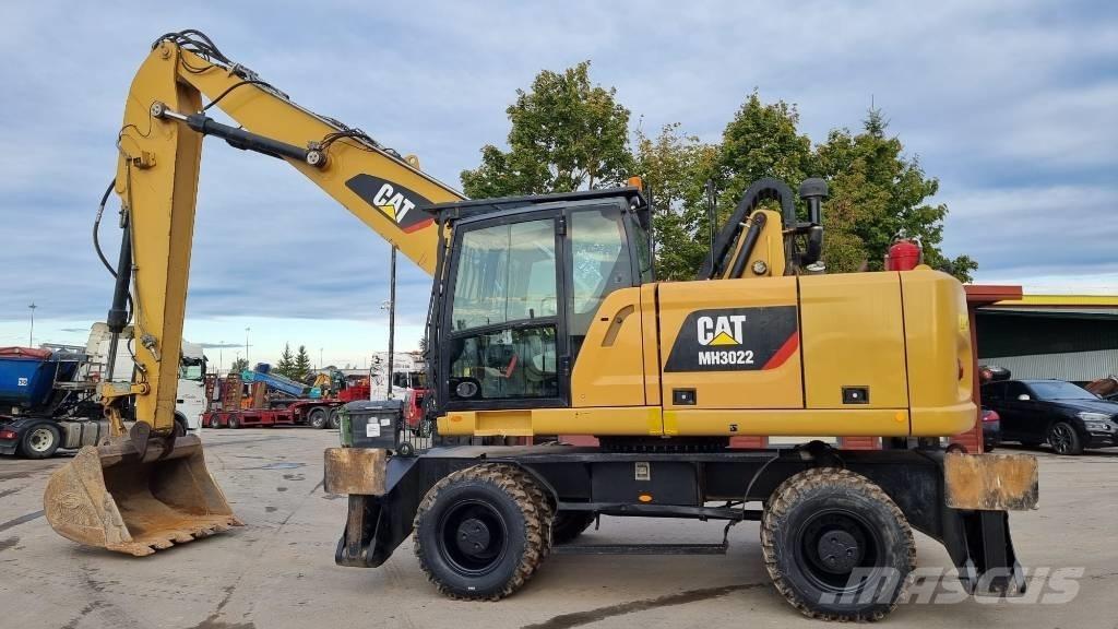 CAT MH 3022 Stroje pre manipuláciu s odpadom