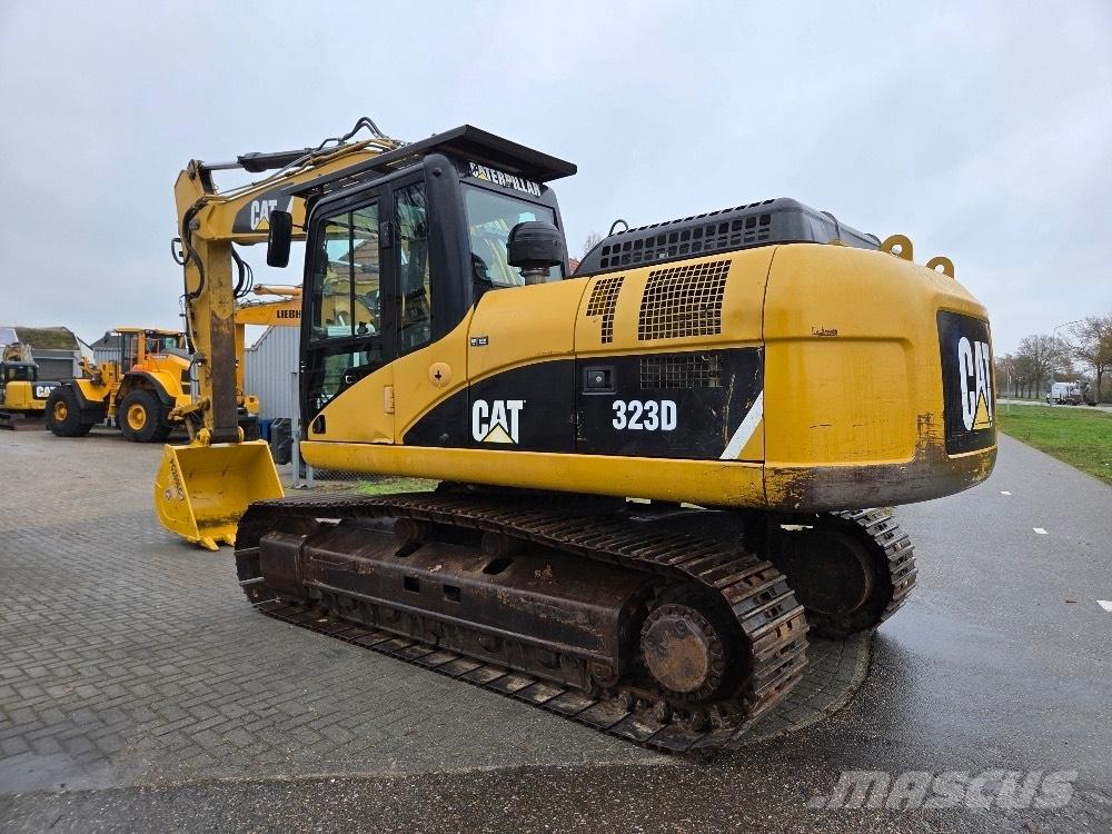CAT 323DL Pásové rýpadlá