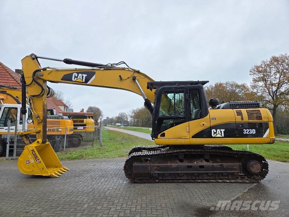 CAT 323DL Pásové rýpadlá