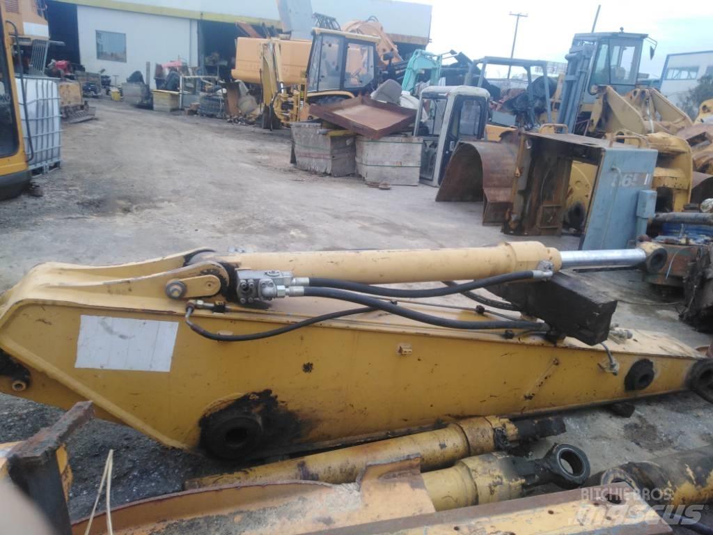 CAT M 318 Podvozky a zavesenie kolies