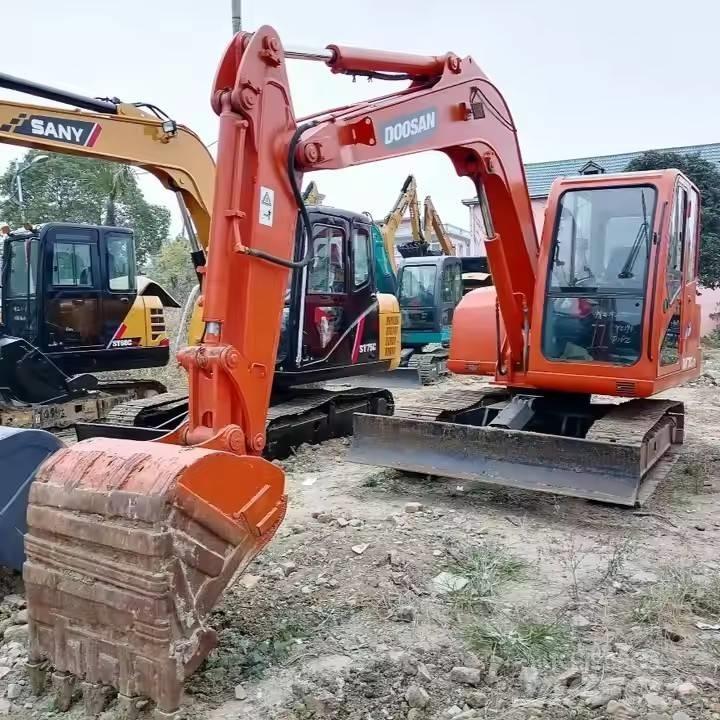 Doosan DH70-7 Pásové rýpadlá