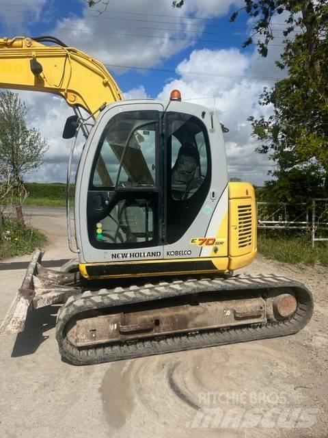 New Holland E 70 SR Midi rýpadlá 7 t - 12 t