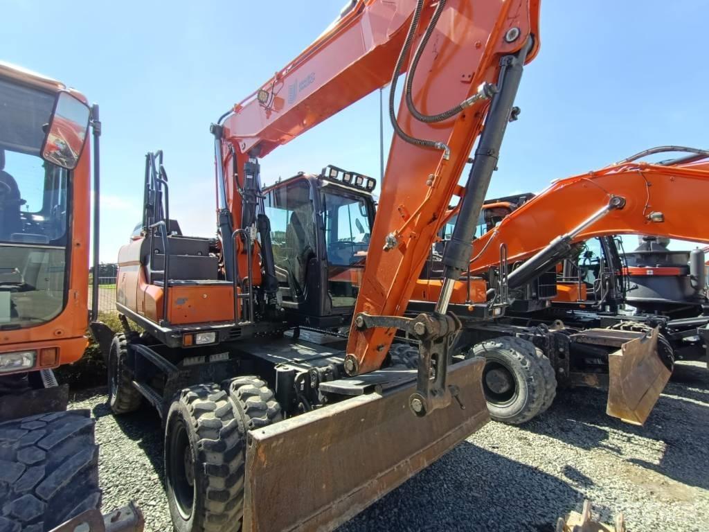 Doosan DX140W-5 Kolesové rýpadlá