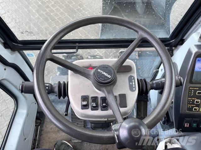 Hyundai Robex 140 W Kolesové rýpadlá
