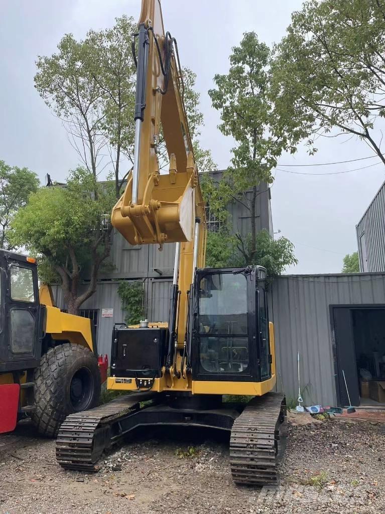 CAT 310 Pásové rýpadlá