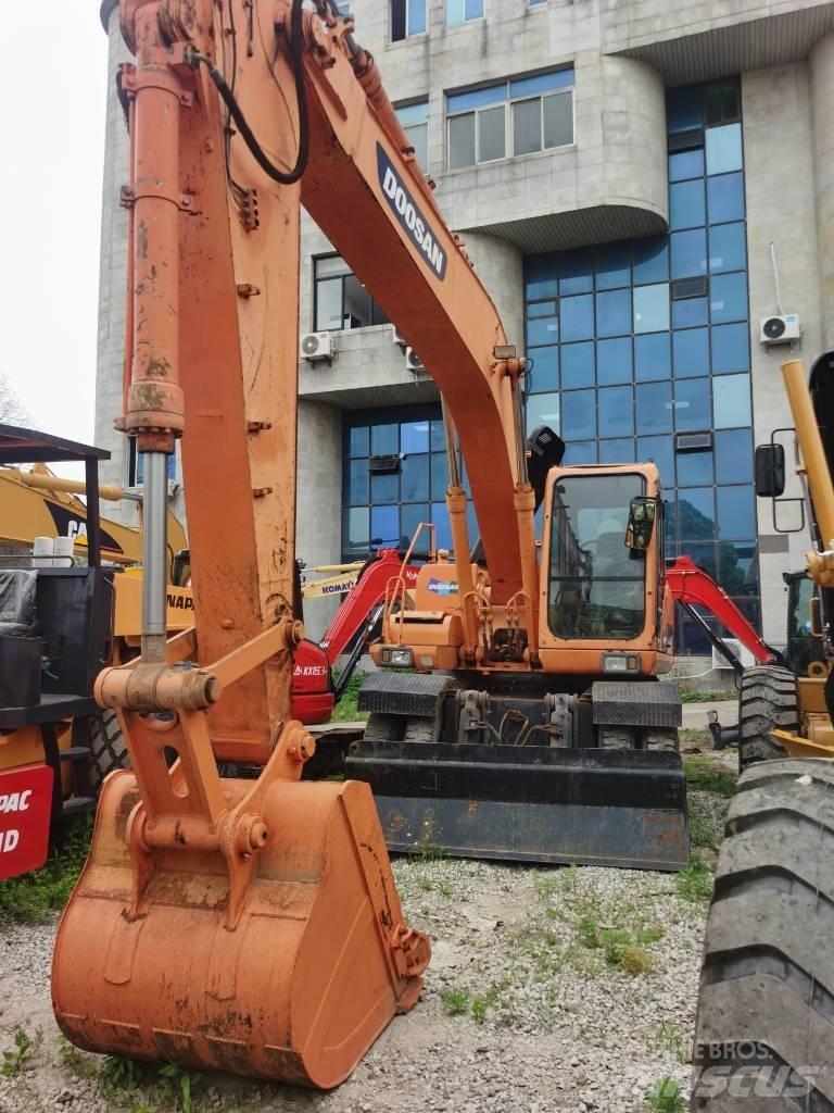 Doosan DH 210 W-7 Kolesové rýpadlá