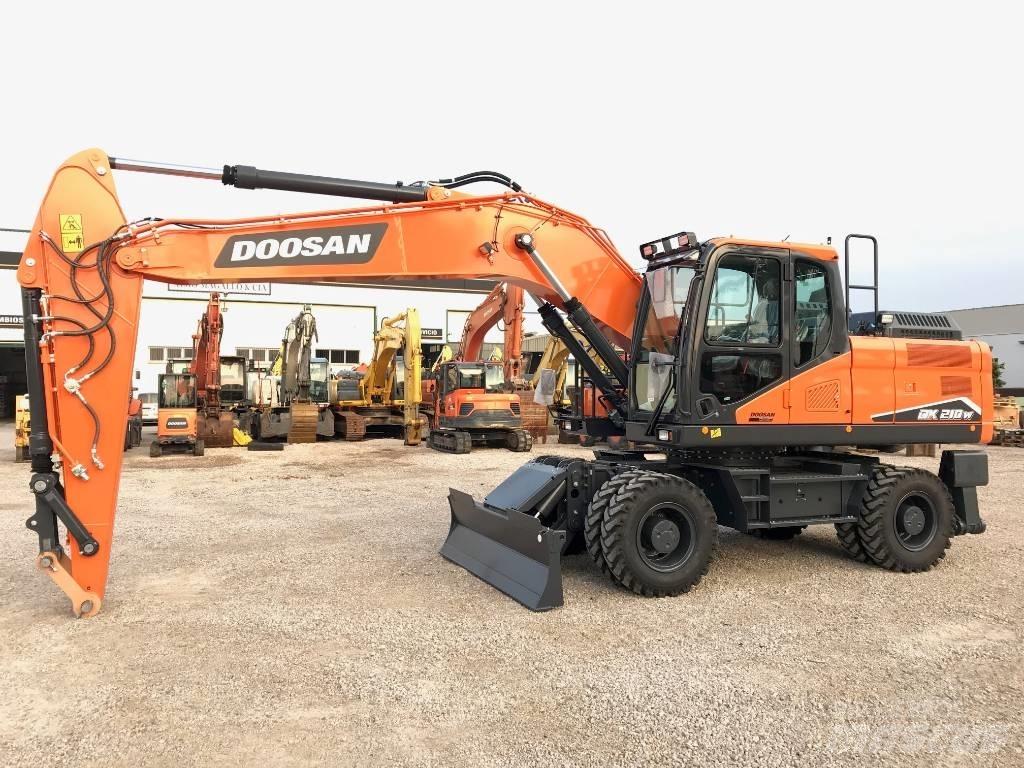 Develon DX 210 W-7 Kolesové rýpadlá