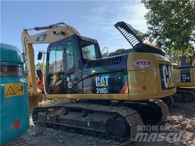 CAT 318DL Pásové rýpadlá