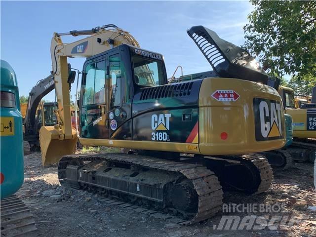 CAT 318DL Pásové rýpadlá