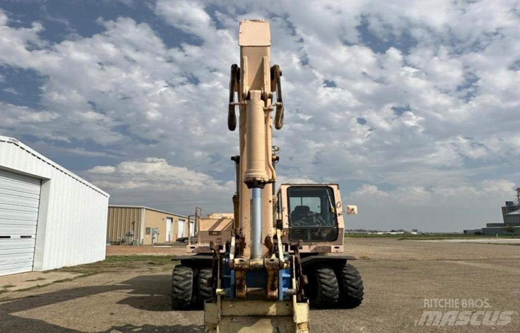 John Deere 595 Kolesové rýpadlá