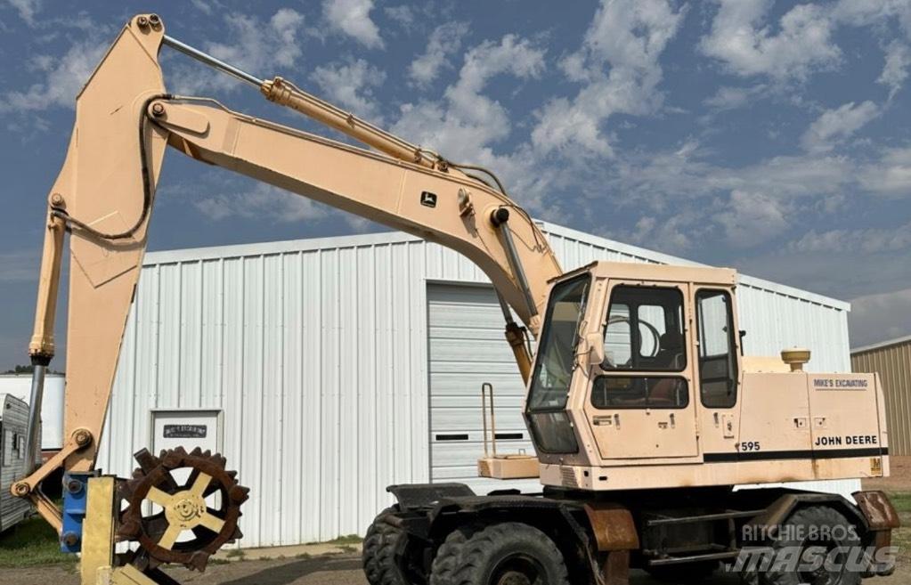 John Deere 595 Kolesové rýpadlá